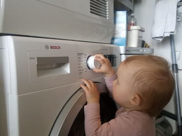 چگونه قفل کودک ماشین لباسشویی را باز کنیم